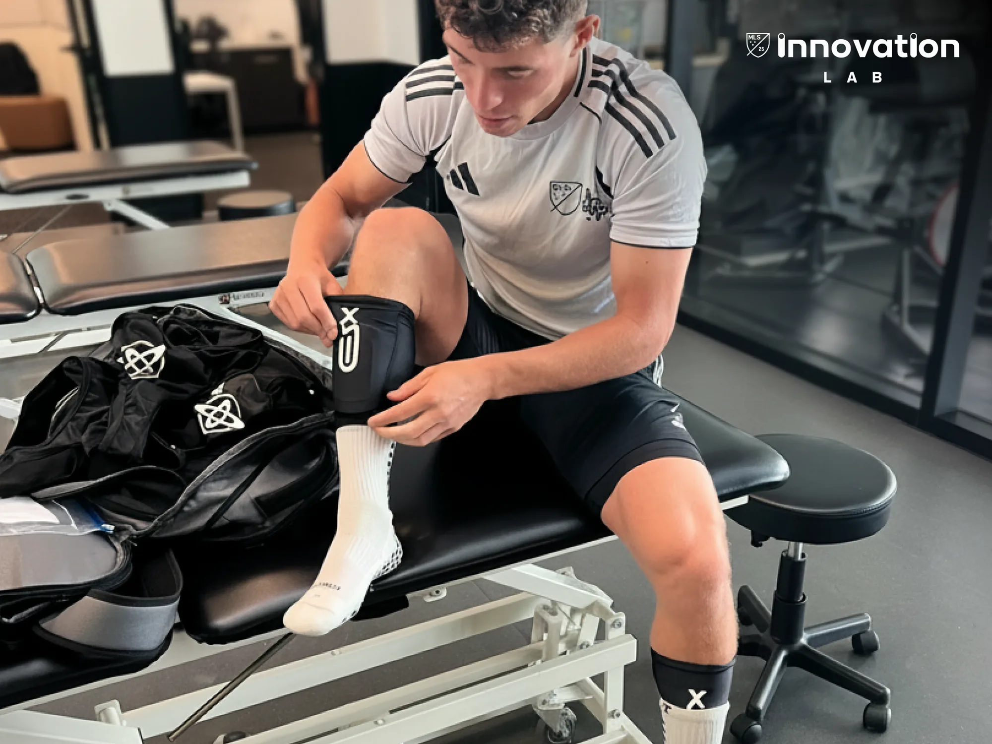 MLS NEXT player fitting XSEED smart shinguards during the MLS Innovation Lab programme